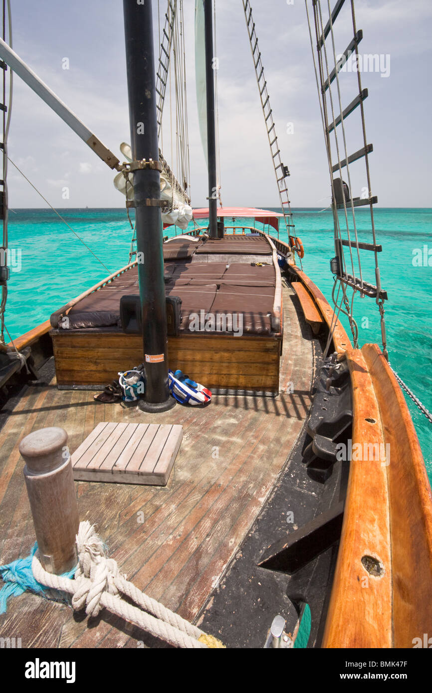 Beautiful old wooden sailing ship on calm blue sea, Aruba, Caribbean. Stock Photo