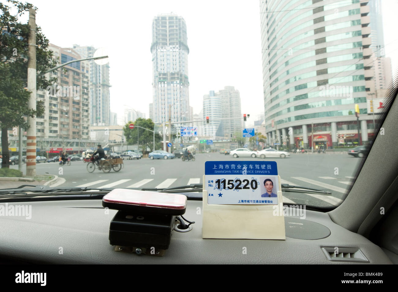 Taxi driver's id badge and number, Shanghai, China Stock Photo
