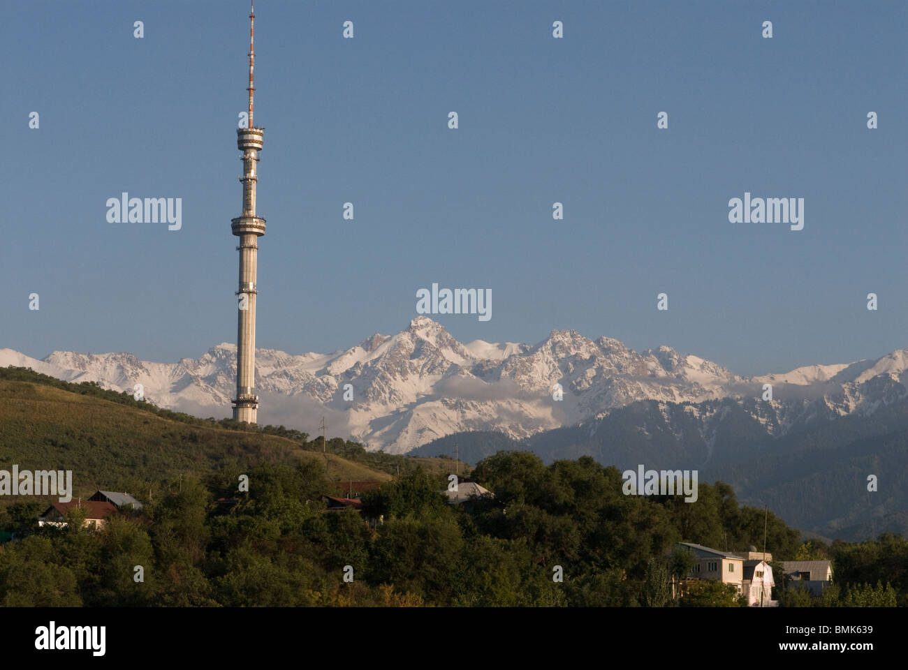 Television tower of Almaty, Altau Range in background, Kazakhstan Stock Photo
