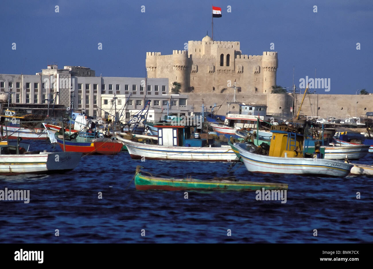 Fishing boats in the Eastern Harbour and Fort Qaitbey, Alexandria, Al ...