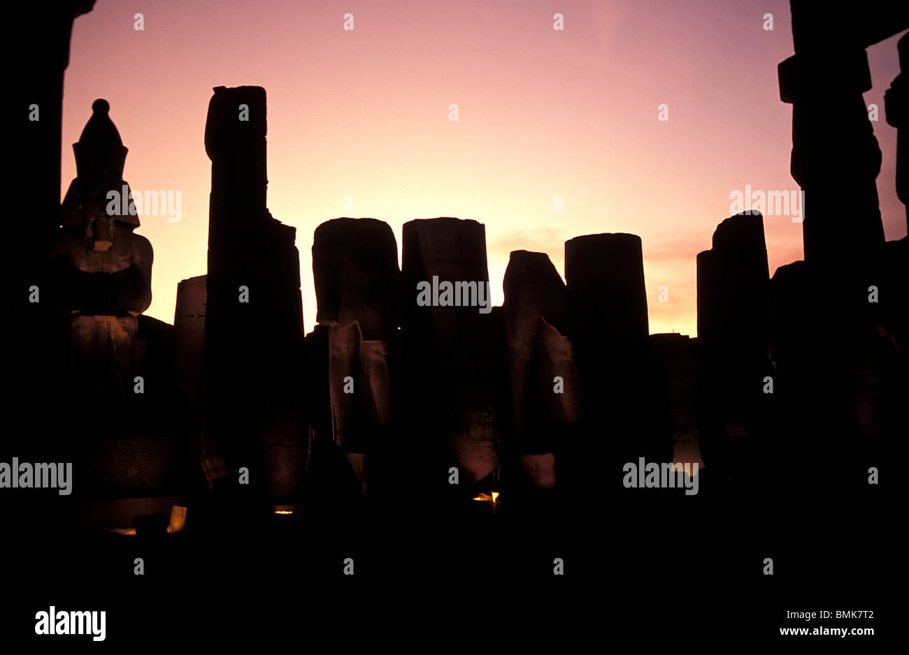 Columns and monumental statues in the Courtyard of Ramses II the Luxor ...