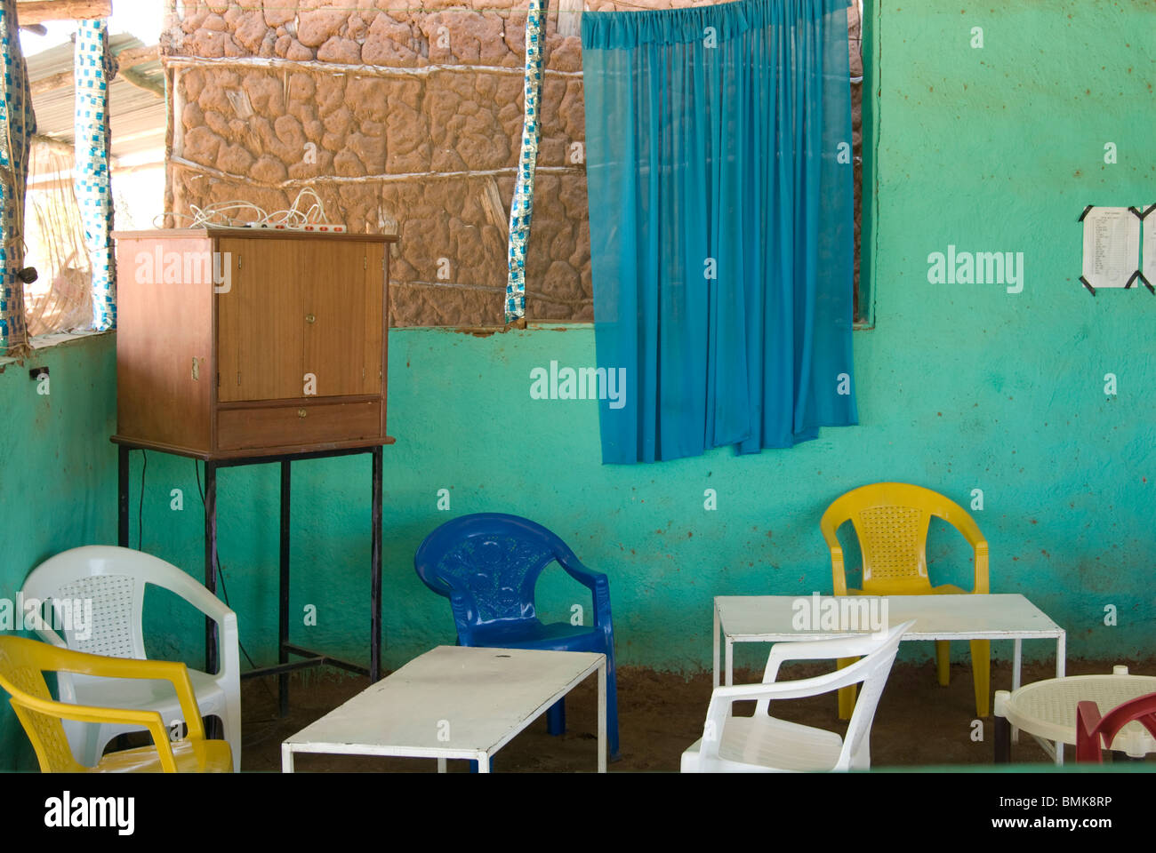 Ethiopia: Lower Omo River Basin, Turmi, Monday market, chairs and table inside local bar Stock Photo