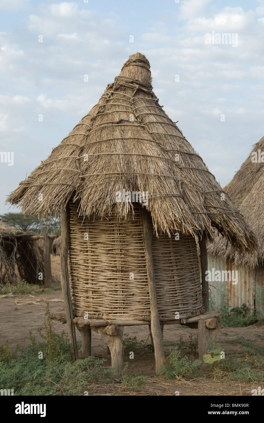 Ethiopia: Lower Omo River Basin, Karo village of Duss, thatched home on stilts for chickens Stock Photo