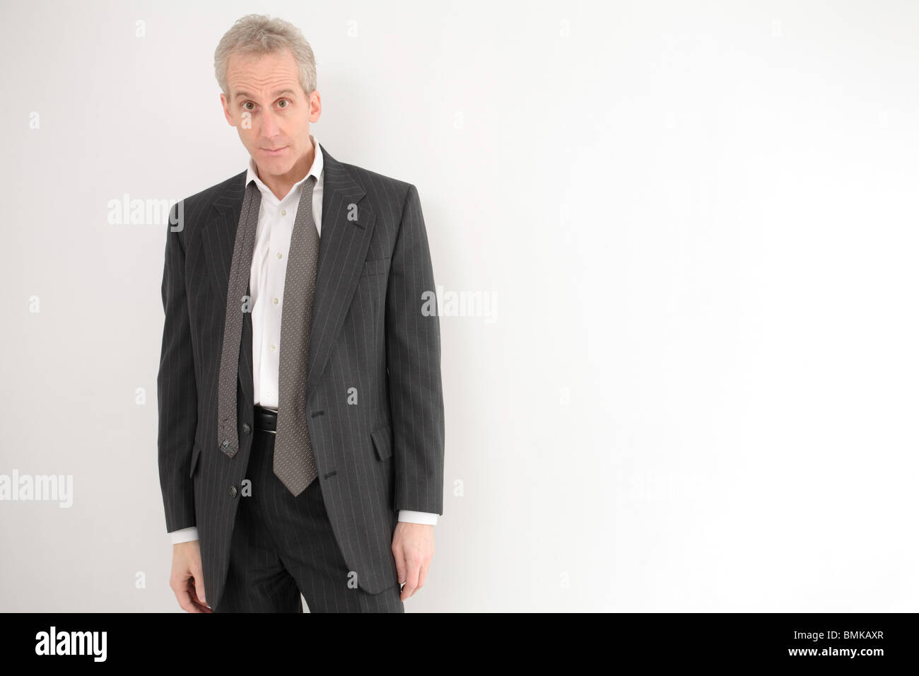 Mature businessman wearing suit, portrait Stock Photo - Alamy