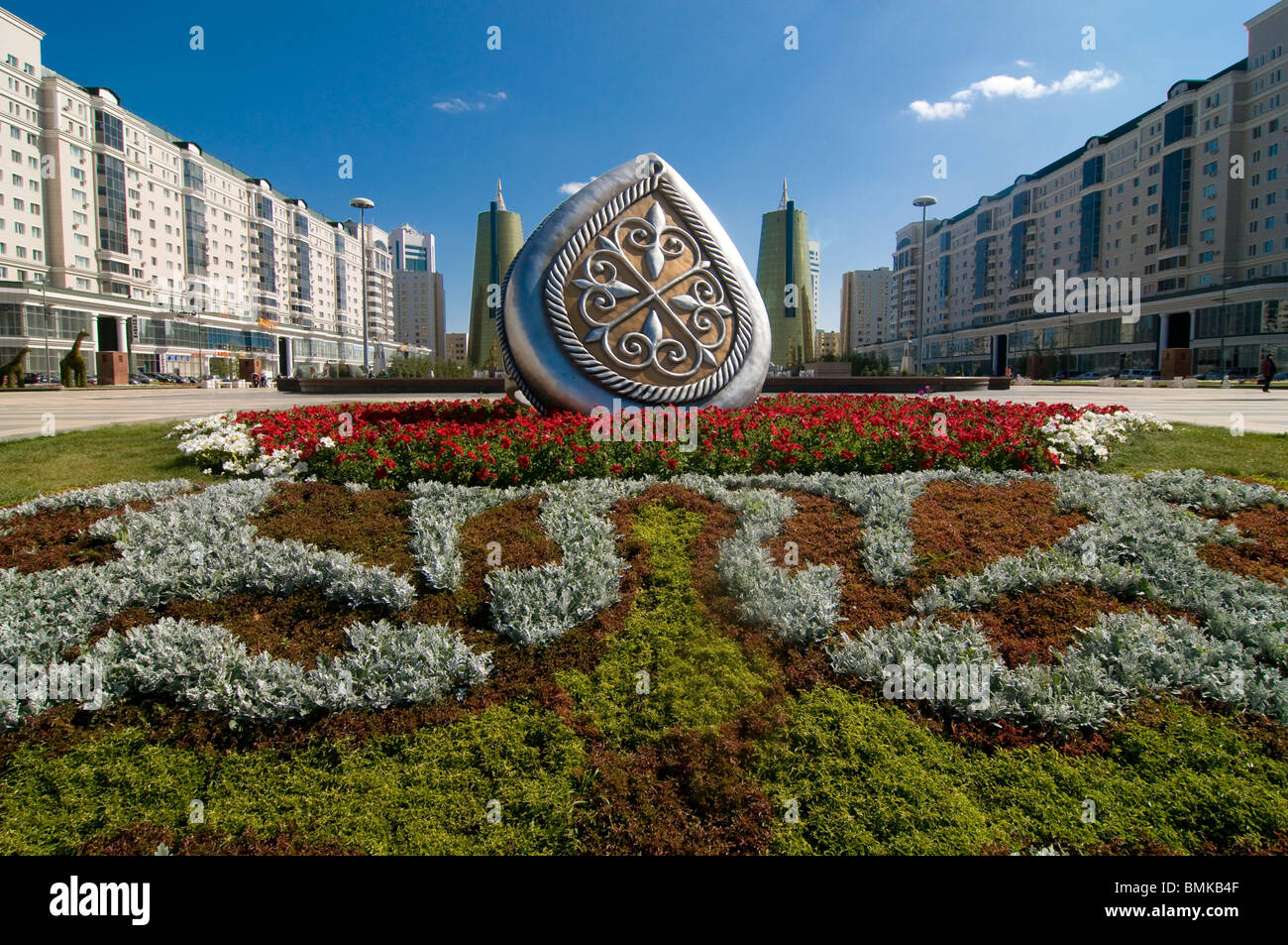 Flowerbeds at Bayterek Tower, landmark of Astana, Kazakhstan Stock Photo