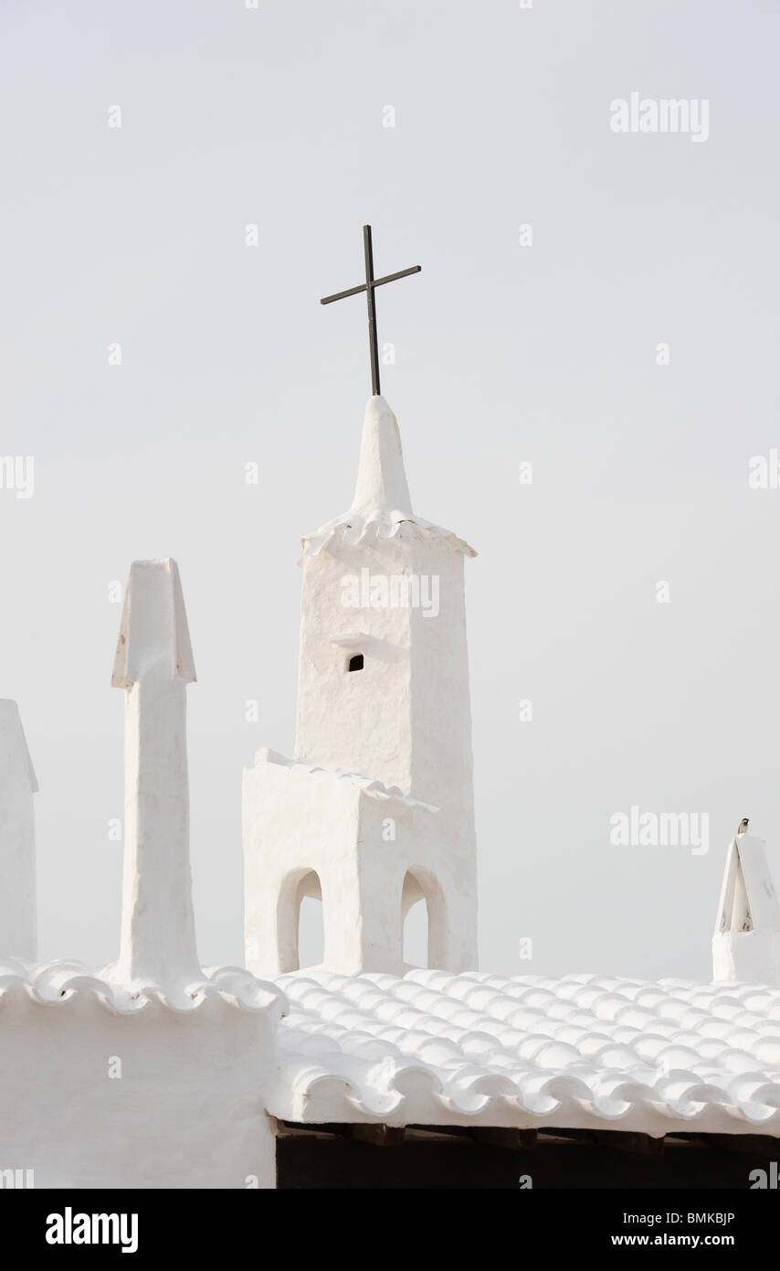 White tower of small church in Binibeca Vell, Menorca, Baleraric Islands, Spain. Hi-key whiteness Stock Photo