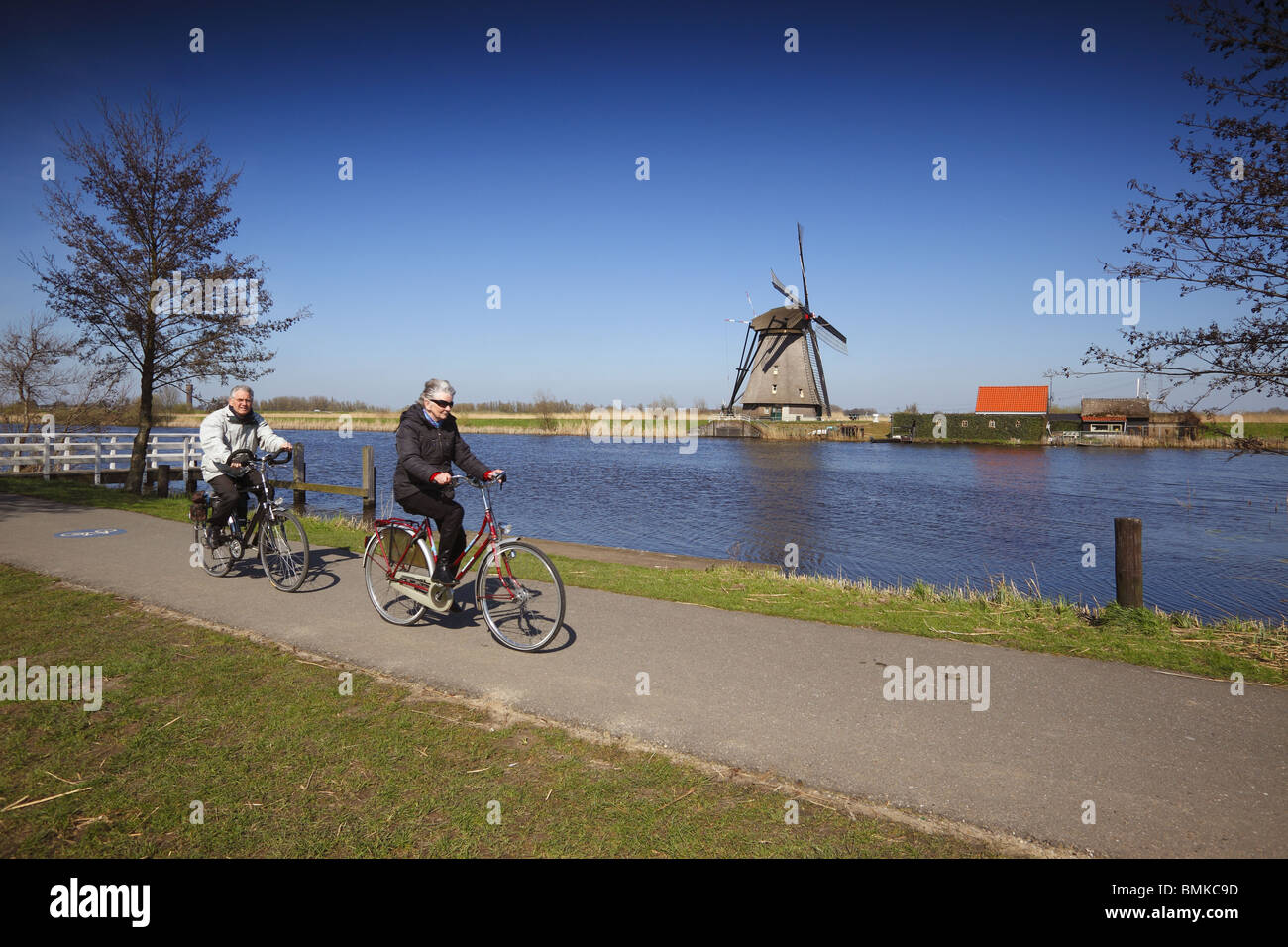 Some of the 19 windmills at Kinderdijk in Holland, a World Heritage Site. Stock Photo