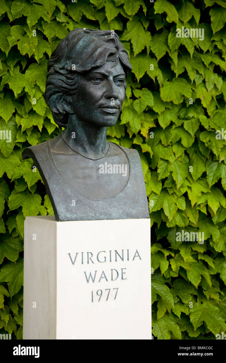 Statue of former British womens' / ladies' champion Virginia Wade, & creeper. Wimbledon tennis championship ground. London. UK Stock Photo
