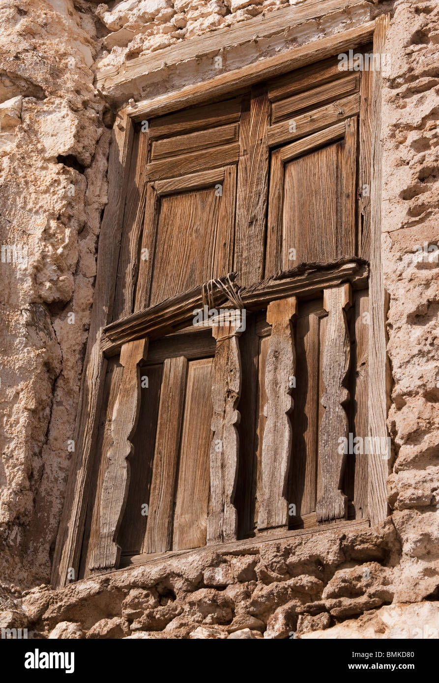 An old wooden door in an Andalucian village Stock Photo