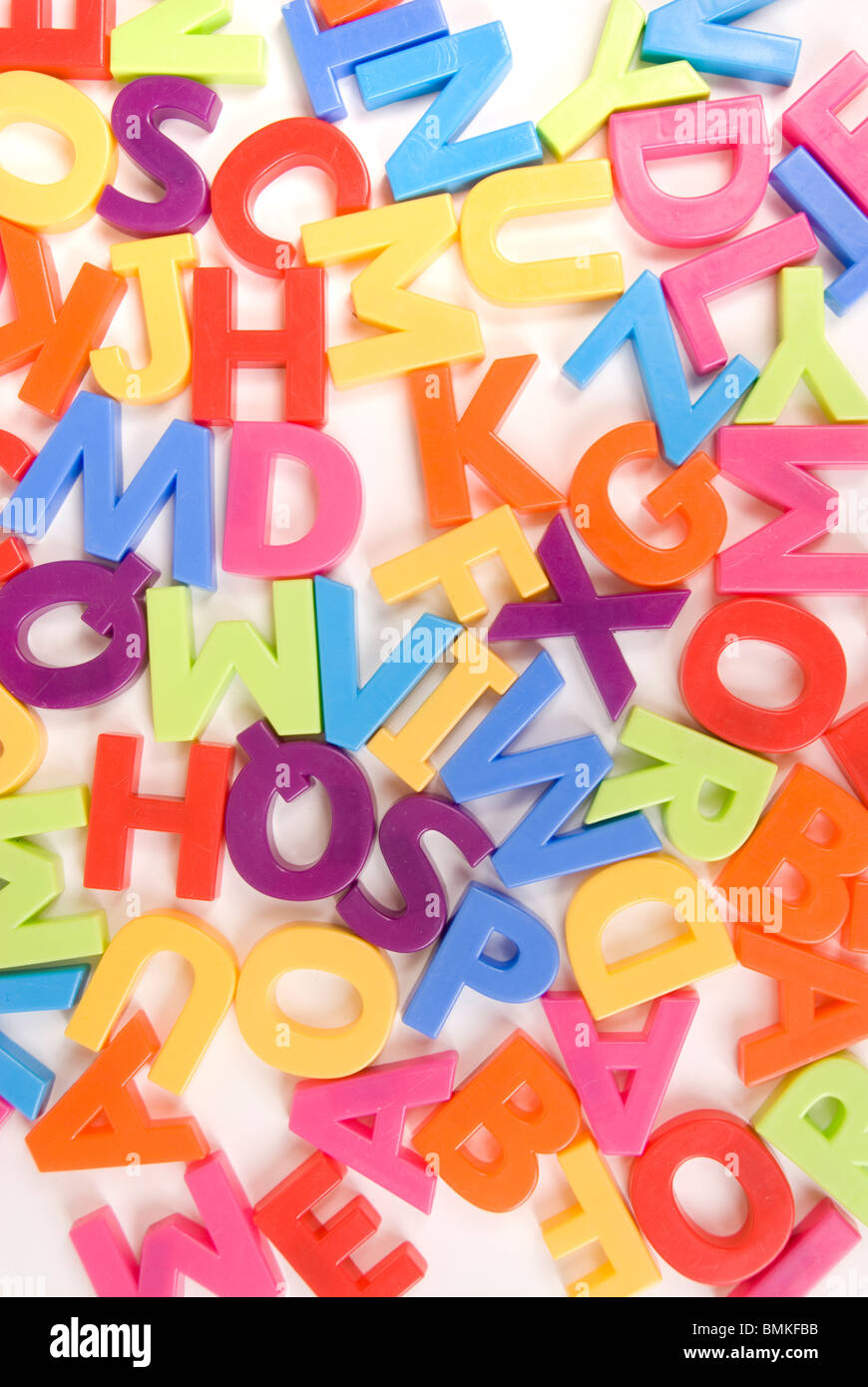 Brightly Colored Childrens Toy Alphabet Letters on White
