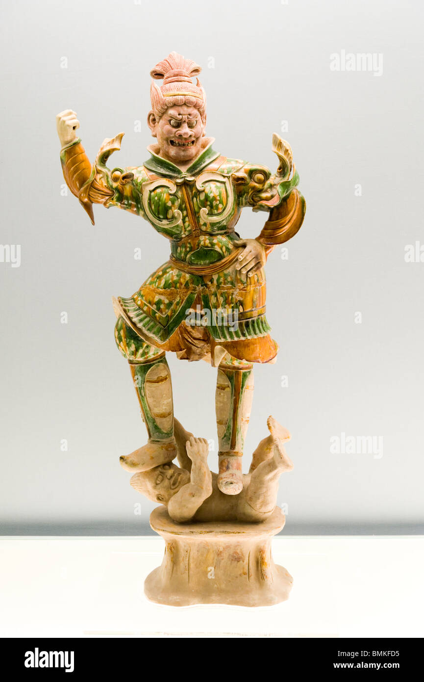 Polychrome glazed pottery statue of a heavenly guardian, Tang Dynasty A.D. 618-907 at the Shanghai Museum, Shanghai, China Stock Photo