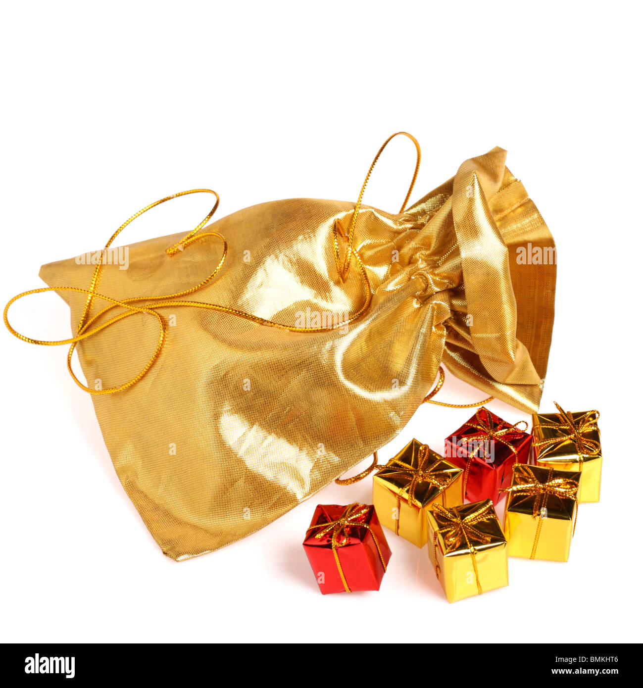 Golden bag with gifts isolated on white Stock Photo Alamy