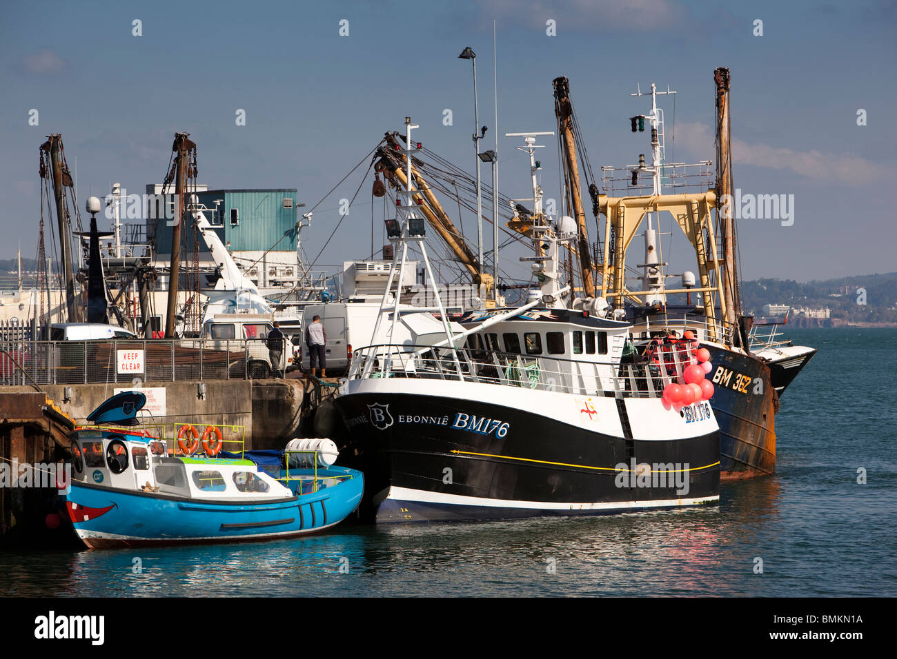 UK, England, Devon, Brixham commercial fishing boats moored in the harbour Stock Photo