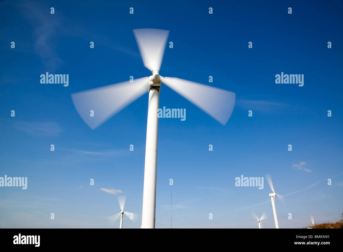 Wind Farm, Wind turbine against blue sky Stock Photo