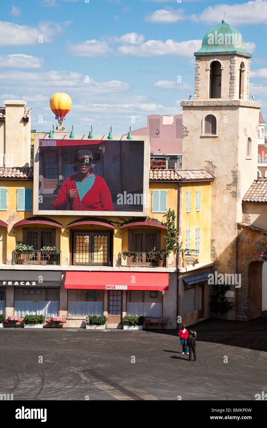 Black woman on camera and on big screen in Lights, Motors, Action