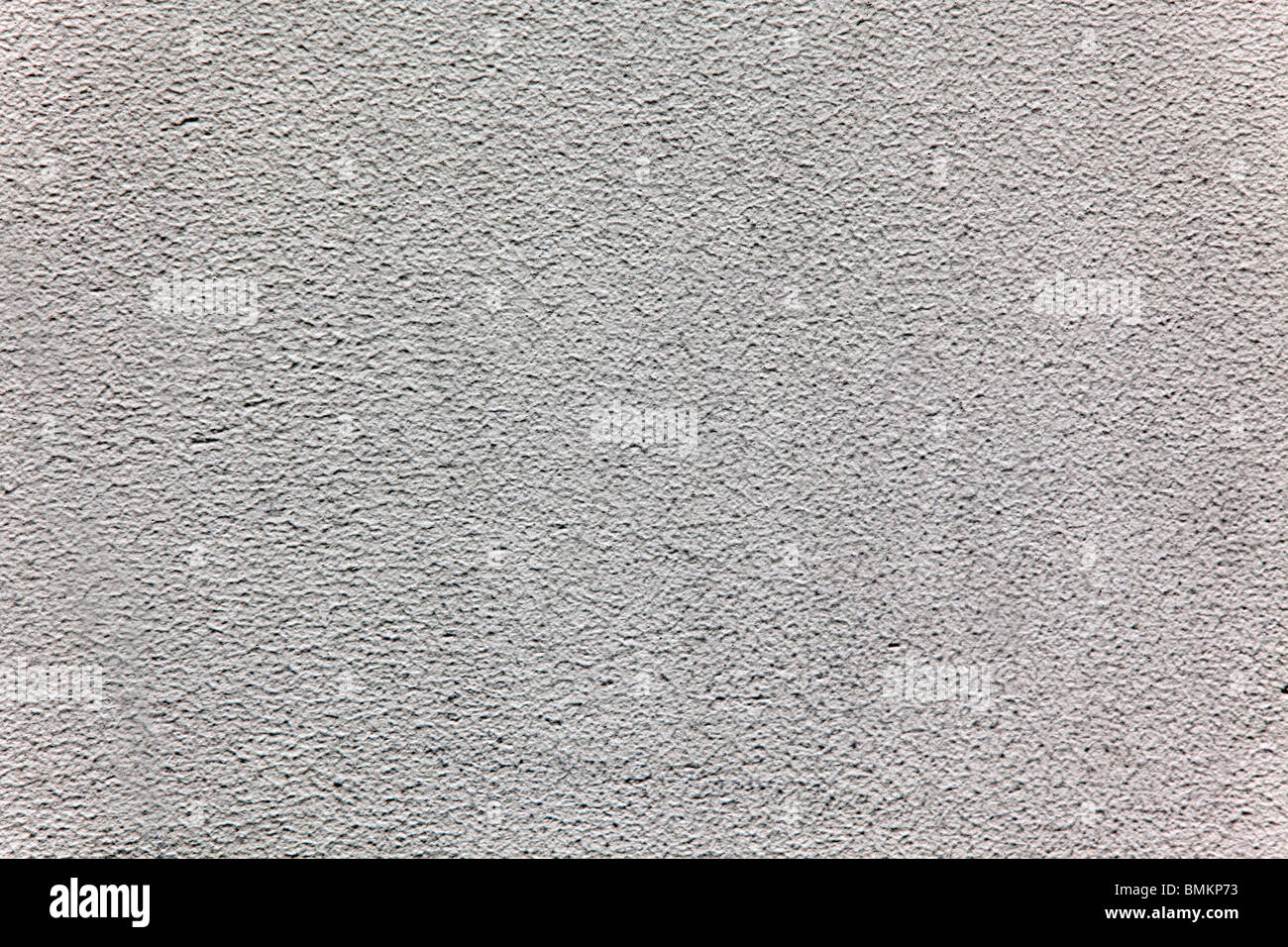 gray colored plaster wall background. horizontal shot Stock Photo