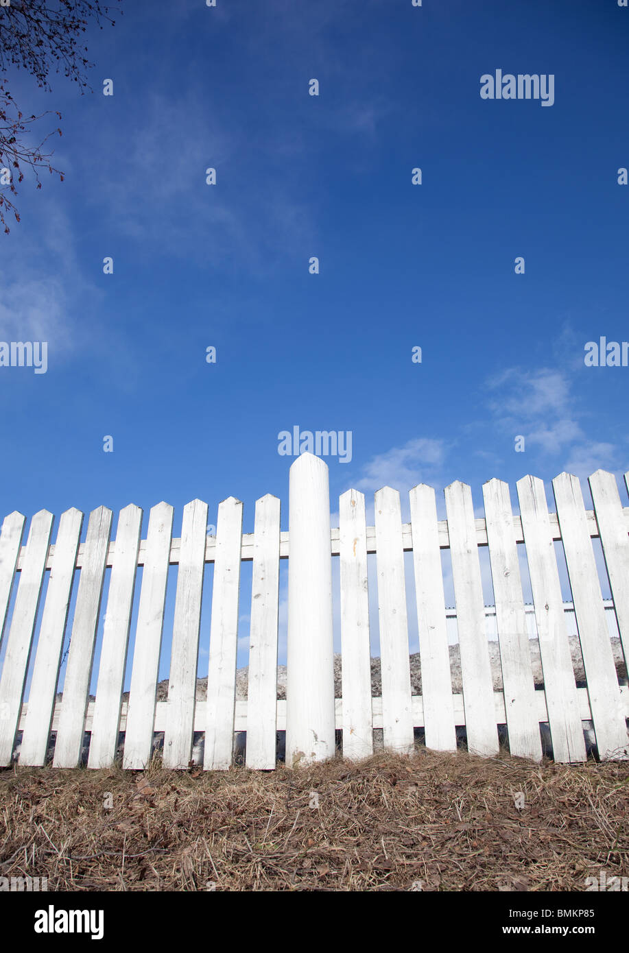 White picket fence against blue sky Stock Photo - Alamy
