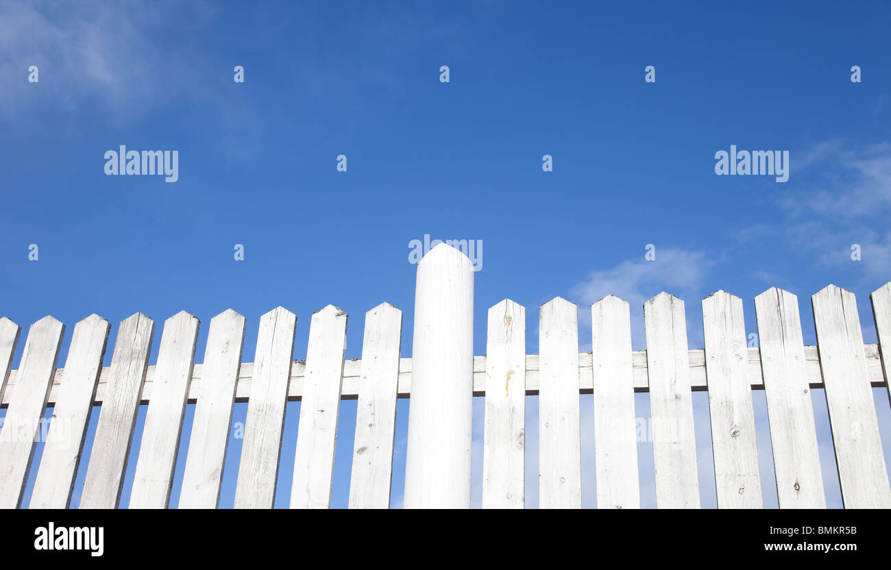 White picket fence against blue sky , Finland Stock Photo - Alamy