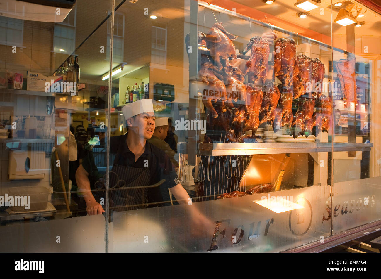 London, UK, Chinatown, Chef Cooking Roast Duck in Window, Chinese