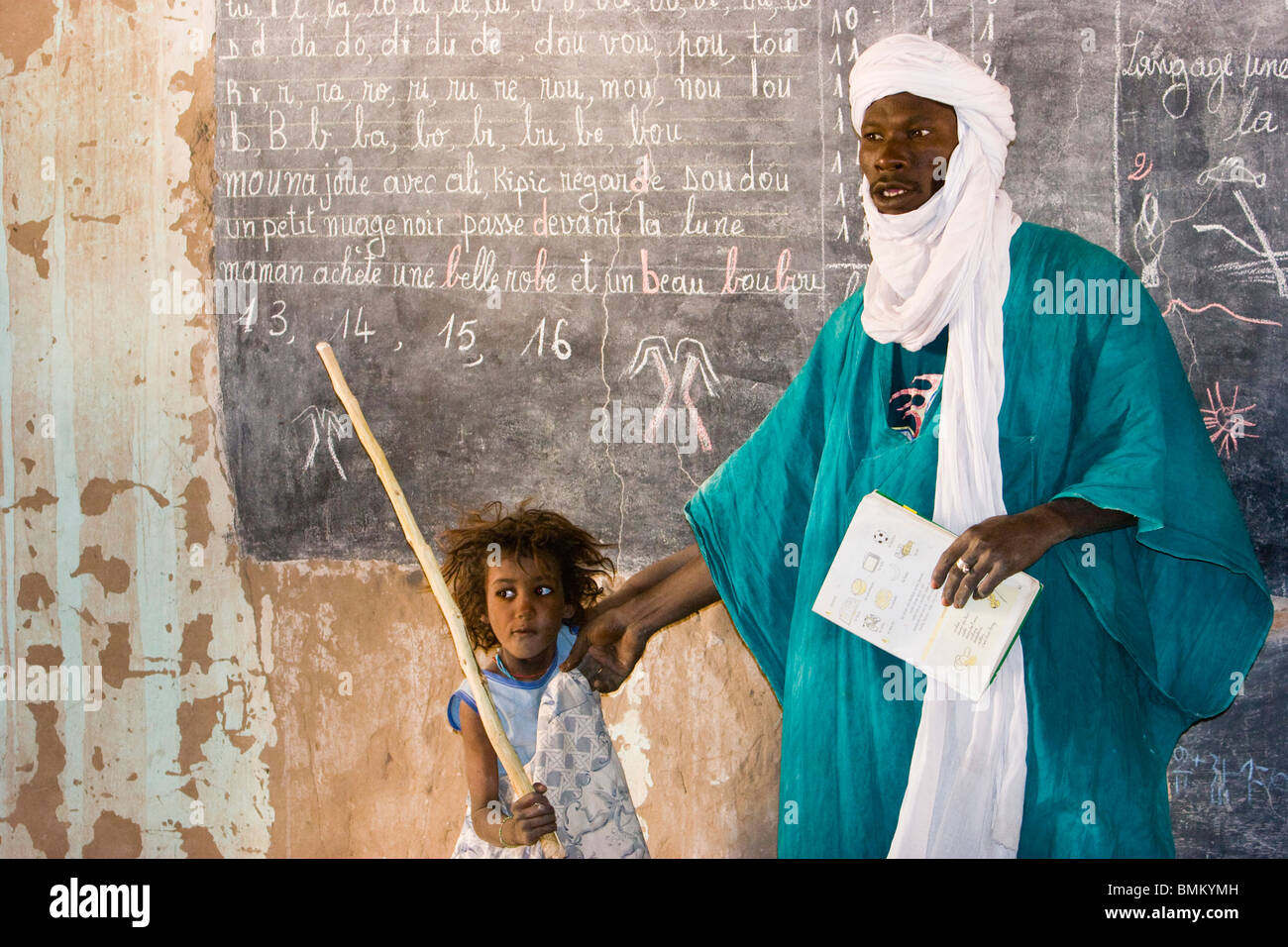 Mali Tuareg Teacher And Girl In Front Of A Blackboard At A Primary Stock Photo Alamy Mali Tuareg Teacher And Girl In Front Of A Blackboard At A Primary Stock Photo Alamy