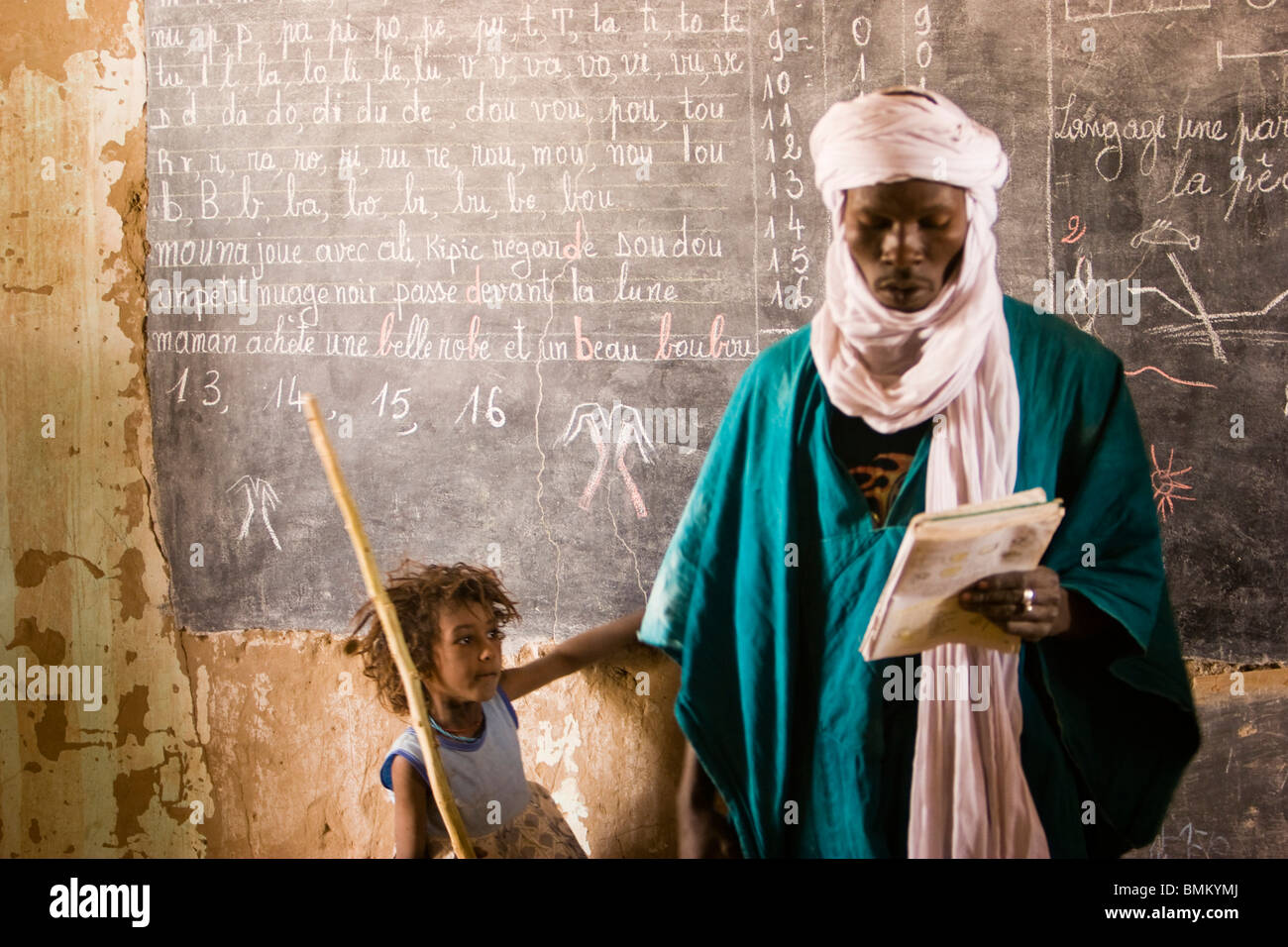 Mali Tuareg Teacher And Girl In Front Of A Blackboard At A Primary Stock Photo Alamy Mali Tuareg Teacher And Girl In Front Of A Blackboard At A Primary Stock Photo Alamy