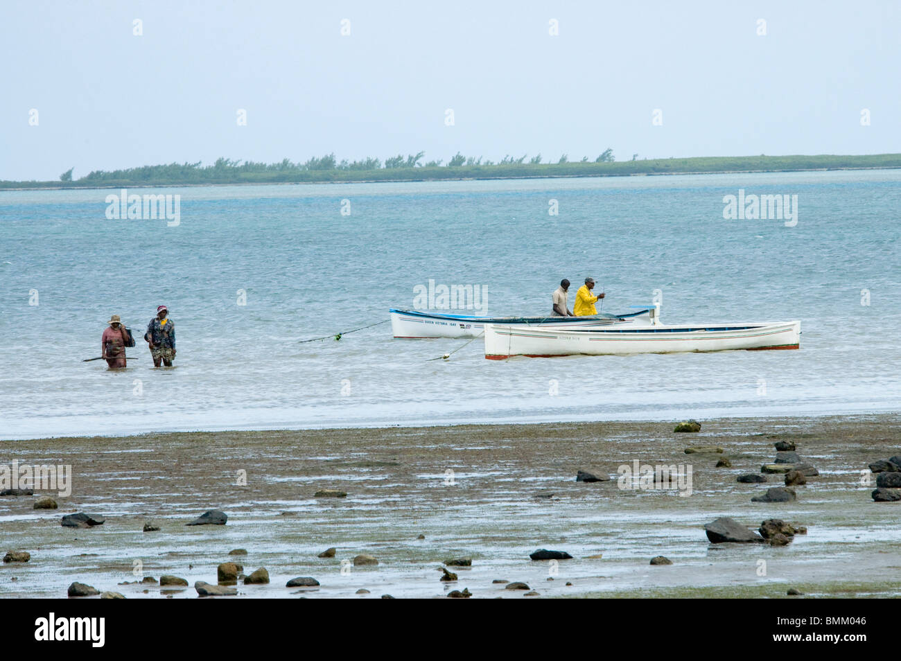 Mauritius, Rodrigues Island, Fishermen in the Indian Ocean by Rodrigues Island Stock Photo