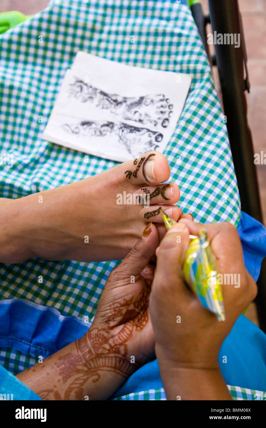 50 yr woman getting East Indian style Henna Tattoo, Southeastern