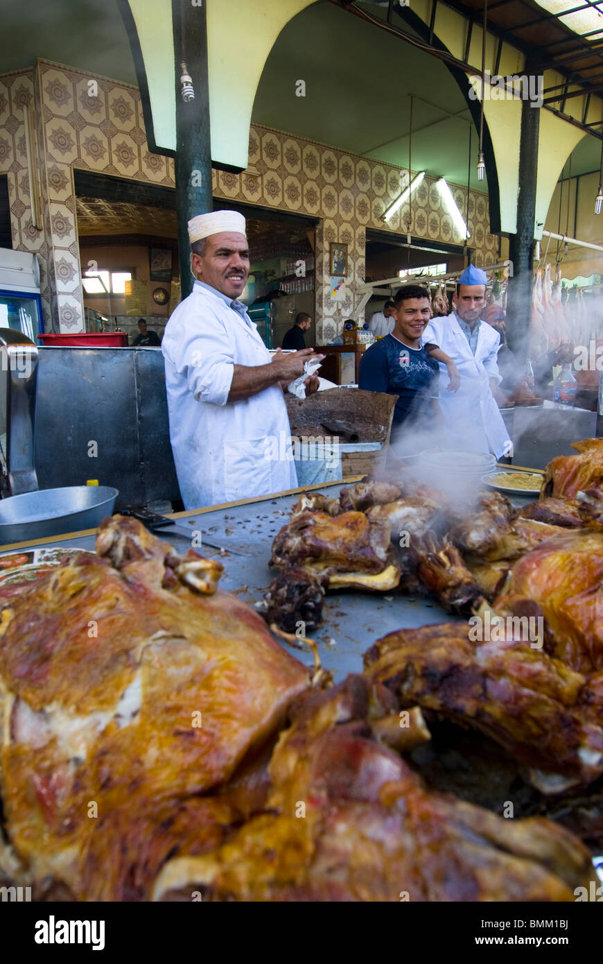Rabat Morocco Moroccan chefs barbecuing meat at an open-air sizzling  barbecue restaurant complex near Rabat Morocco Stock Photo - Alamy