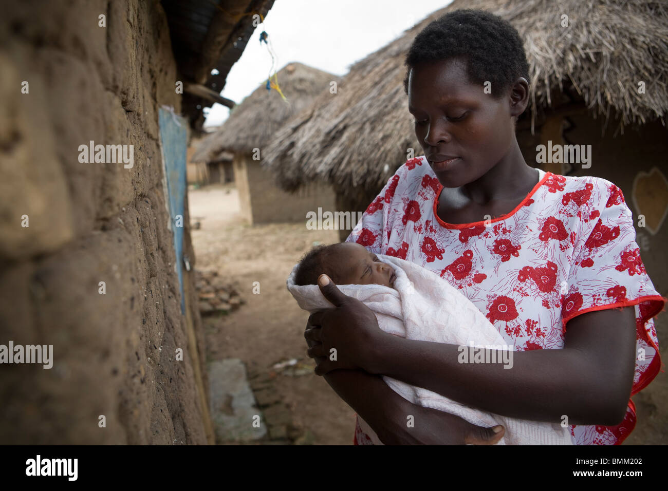 African mother holding her newborn baby - Amuria, Uganda, East Africa ...