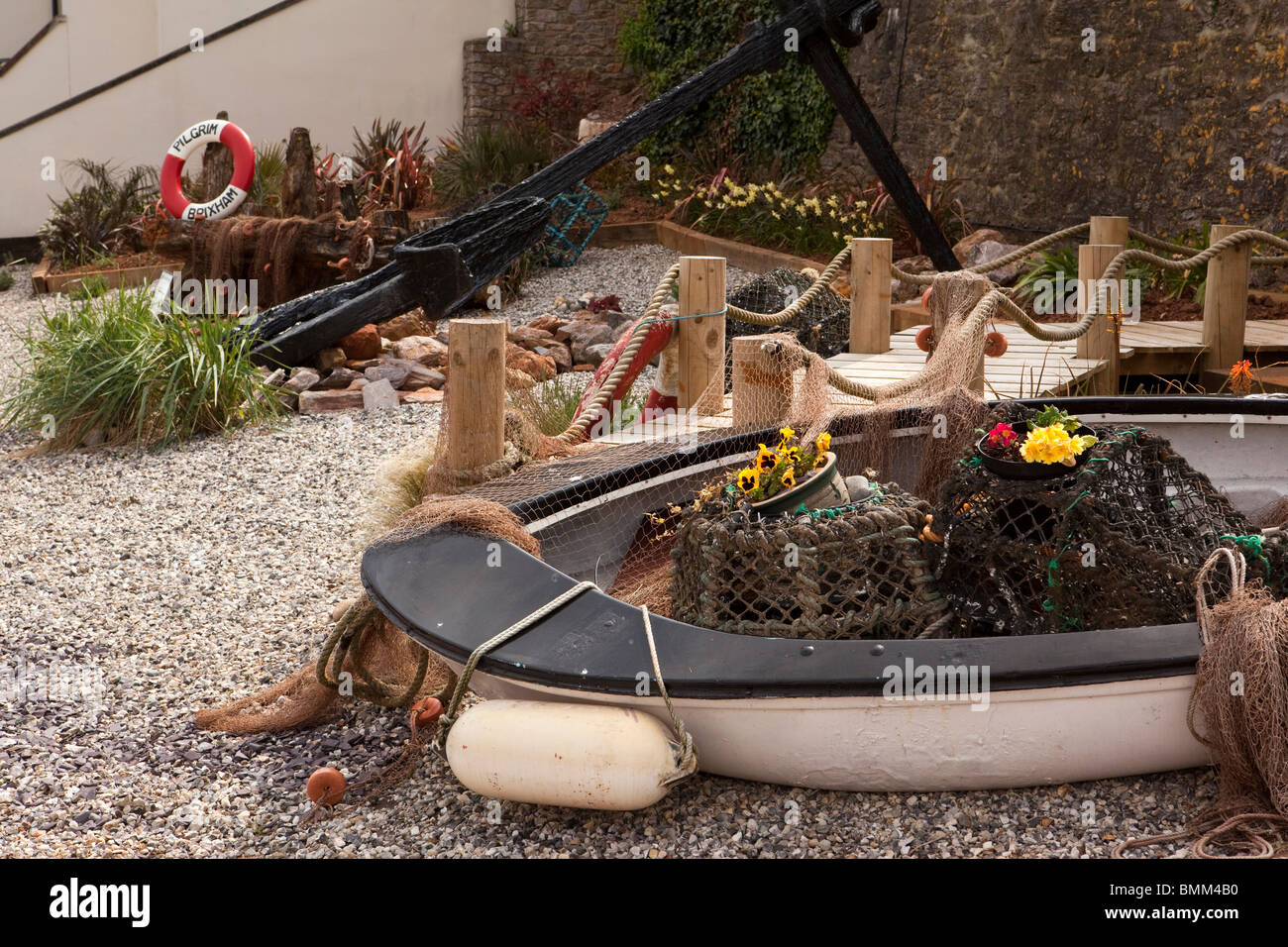 UK, England, Devon, Brixham Harbour, quayside garden with fishing theme Stock Photo