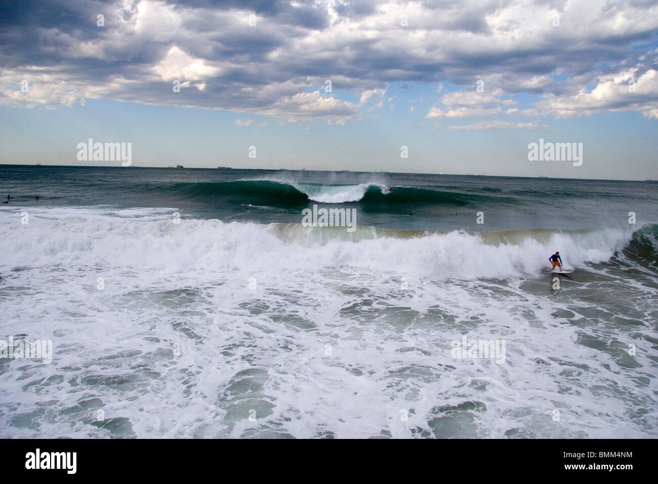 Durban, South Africa. Some epic surf along the Durban pier Stock Photo