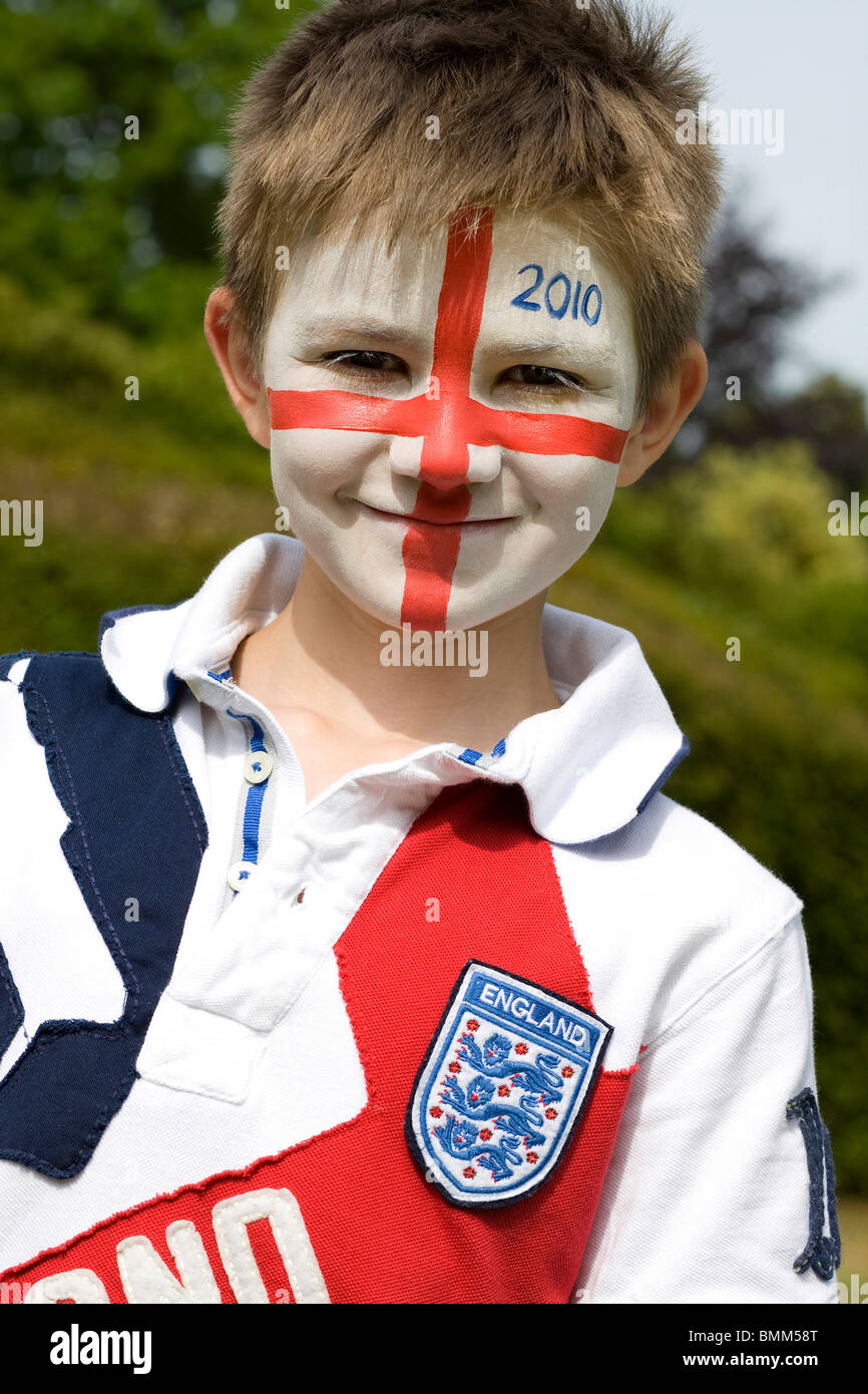 young male boy with face painted england flag Stock Photo