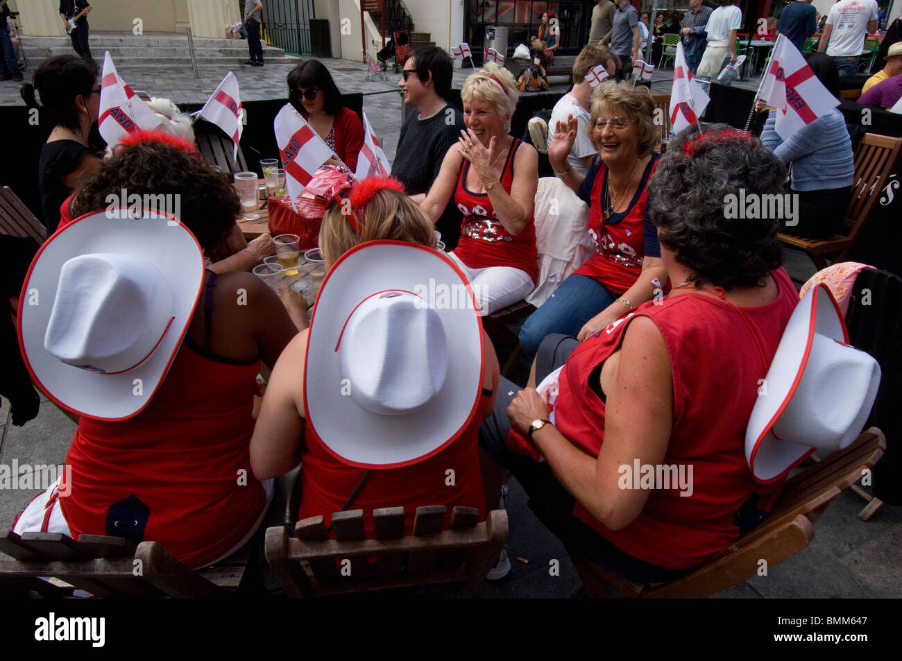 Older women England supporters drinking in Brighton before the first England game of the 2010 world cup Stock Photo