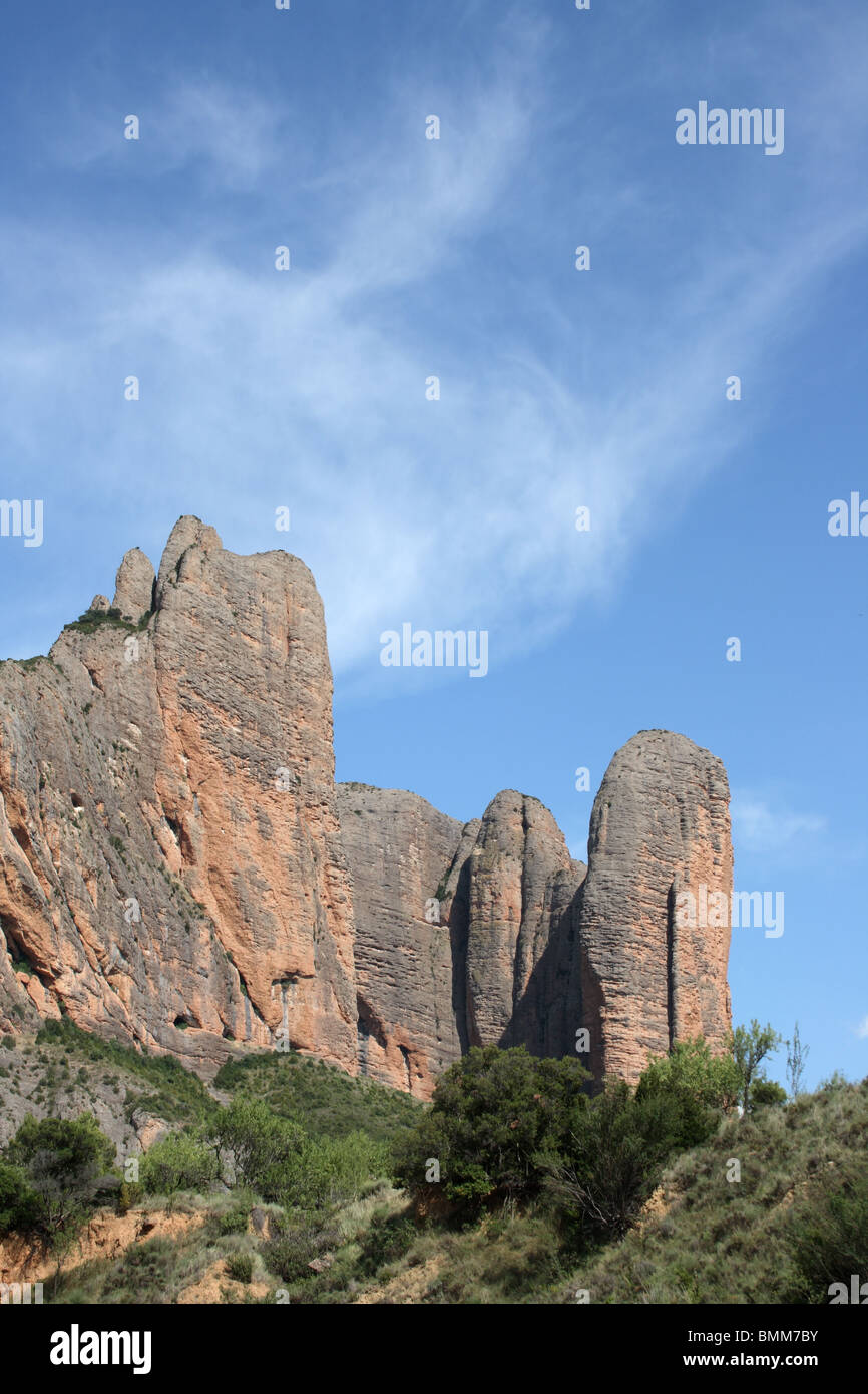 Los Mallos de Riglos rock formations, Huesca to Pamplona Road, Pyrenees, Aragon Stock Photo