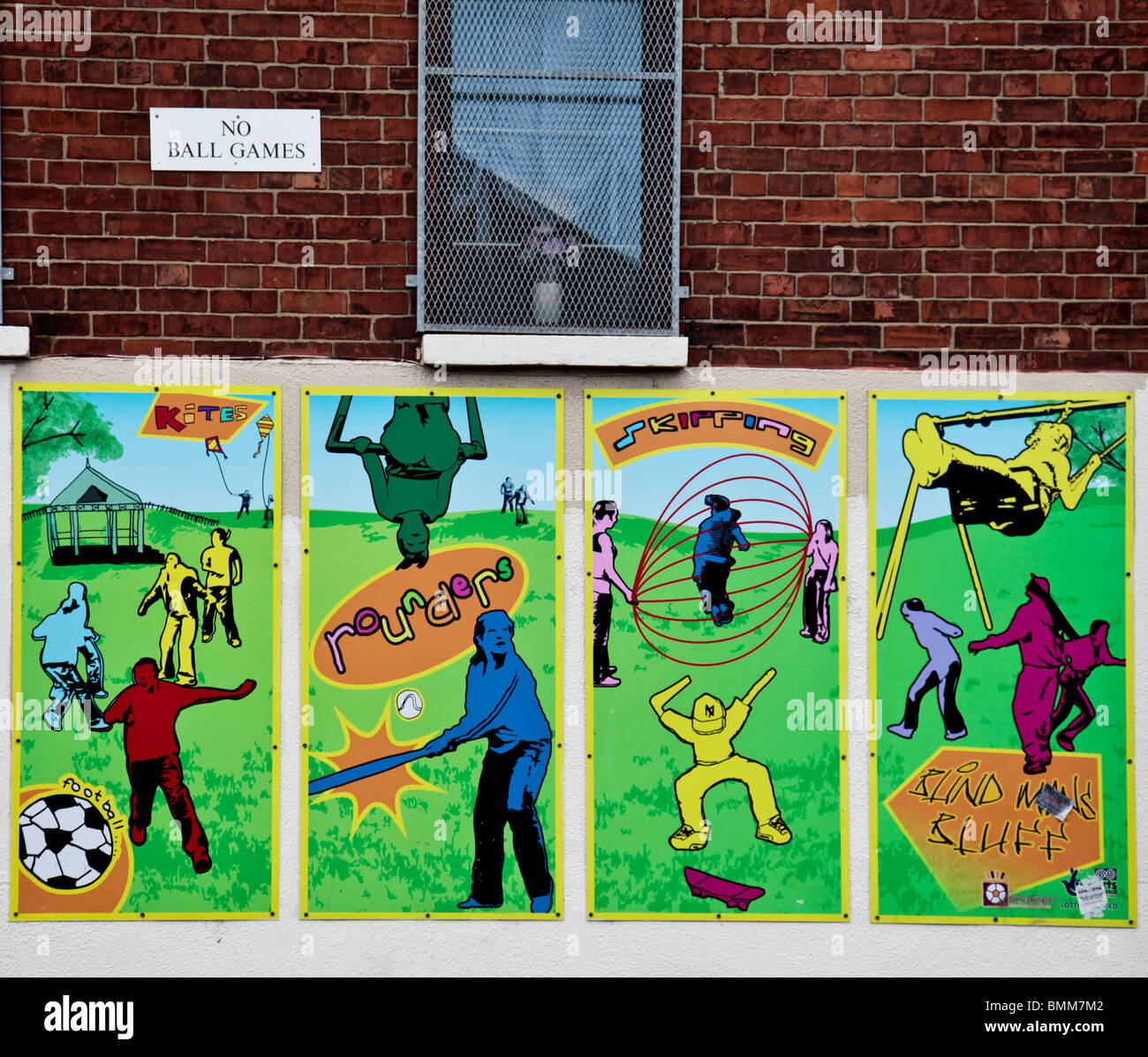 Ironic juxtaposition of a mural in Belfast, depicting children's play