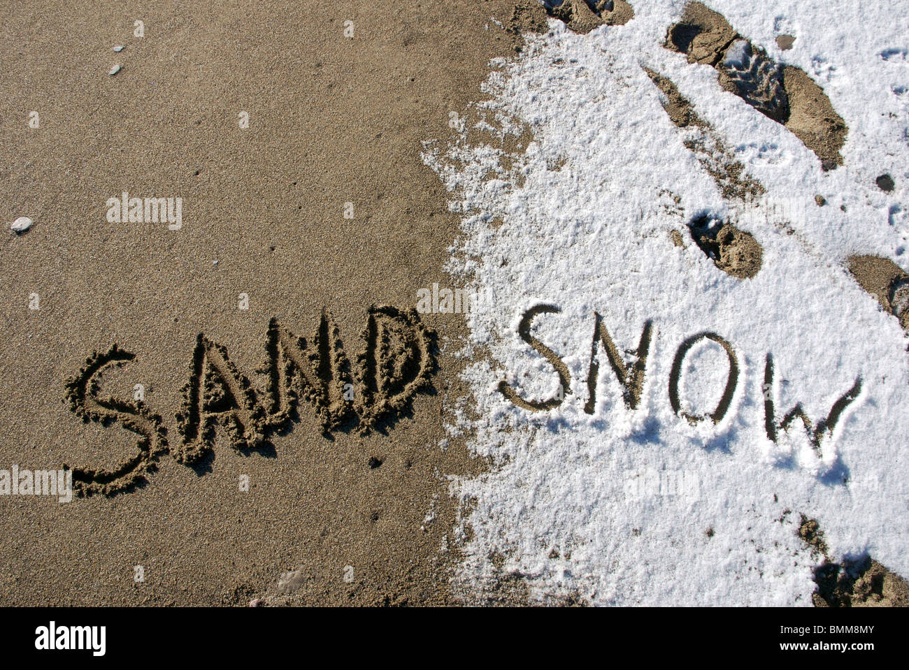Sand and Snow words written in sand and snow on beach, Devon, UK Stock  Photo - Alamy