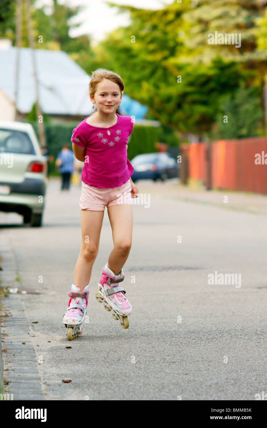 Girl on rollerblades Stock Photo Alamy