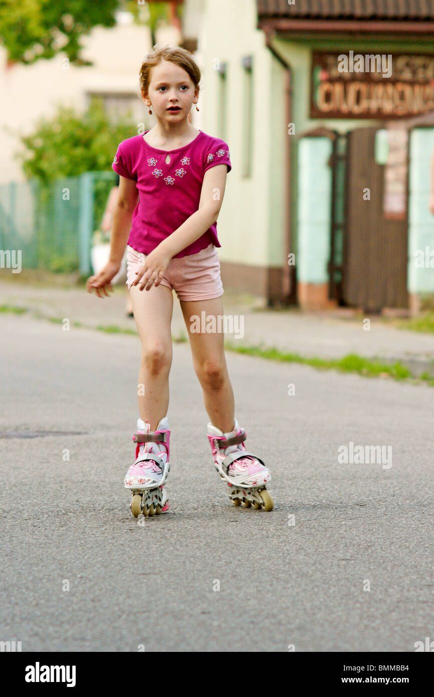 Girl on rollerblades Stock Photo Alamy