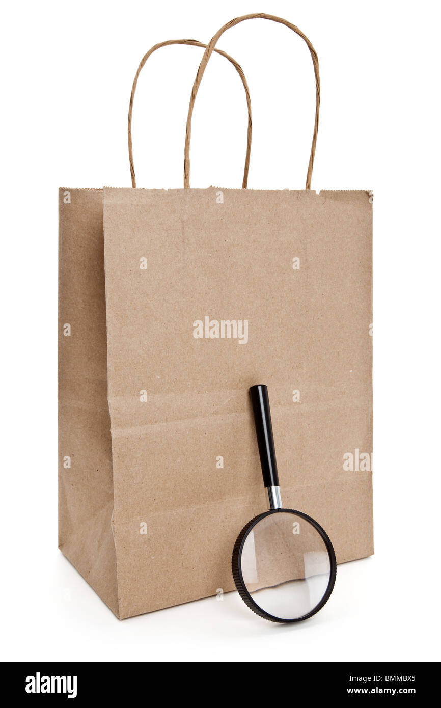 Brown paper shopping bag and Magnifier Stock Photo