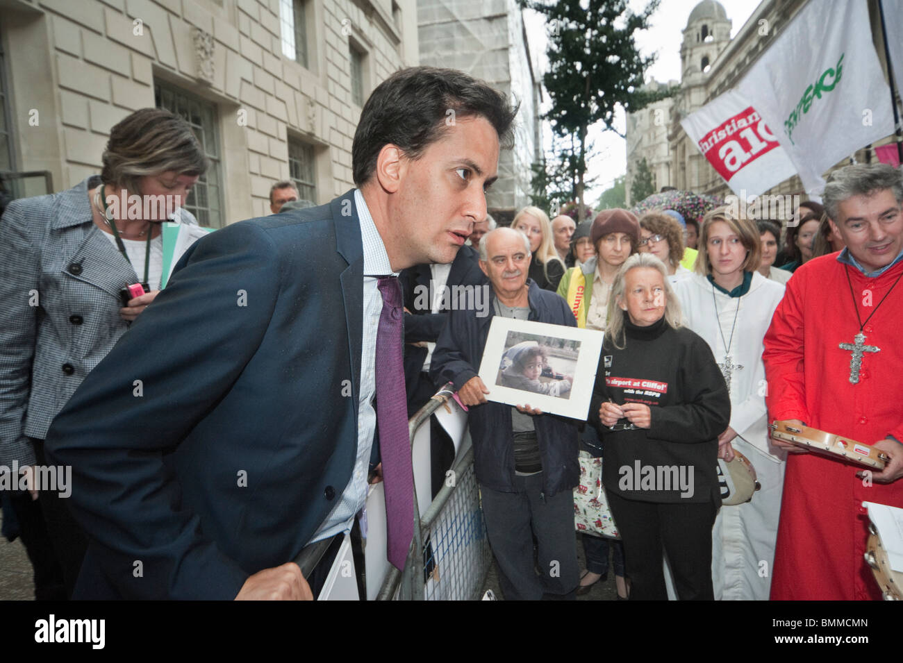 Ed Miliband listens to question at Climate Chaos Coalition (CCC)  vigil outside DECC in Whitehall Stock Photo