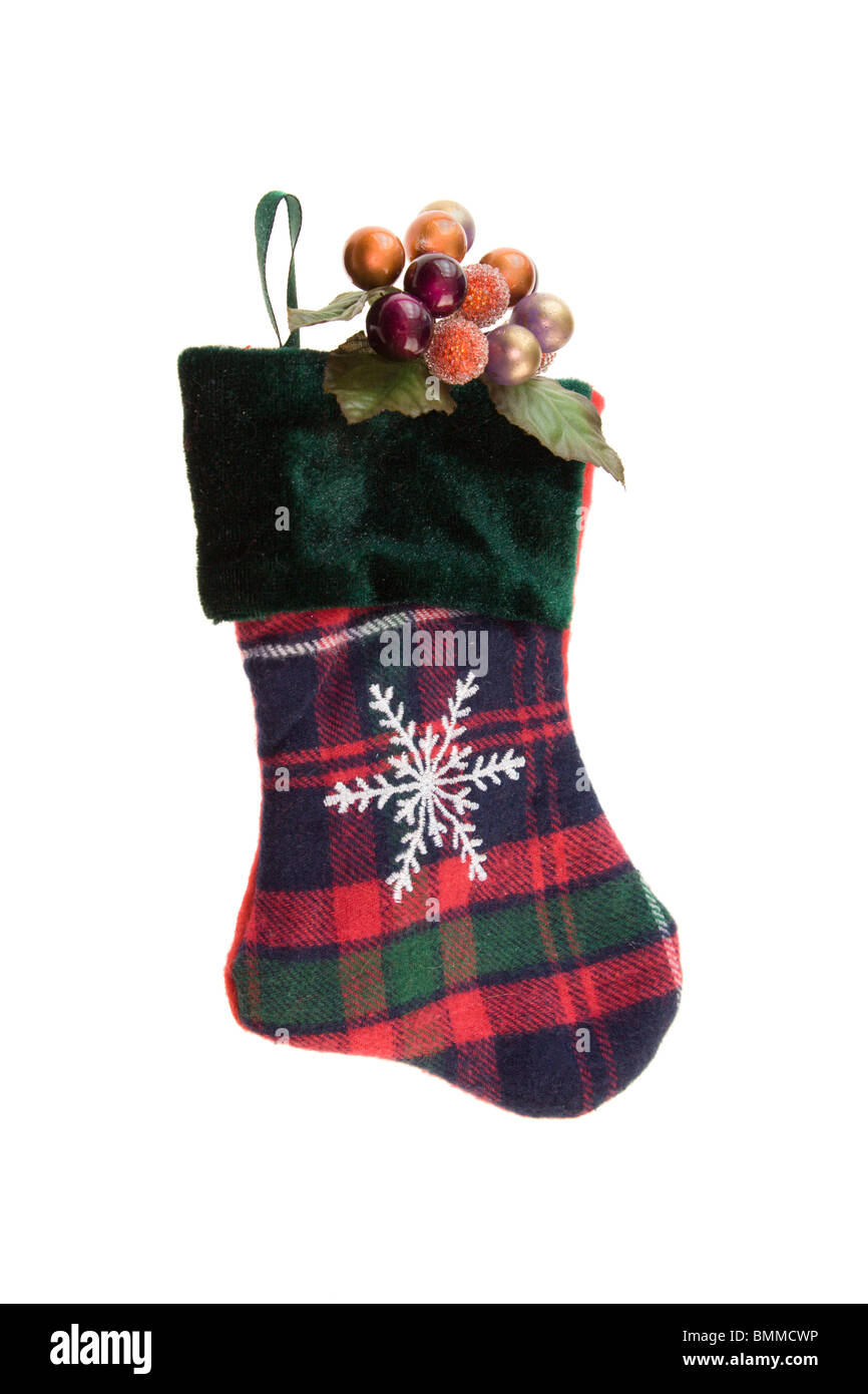 Christmas plaid stocking with seasonal berry accent on white Stock Photo