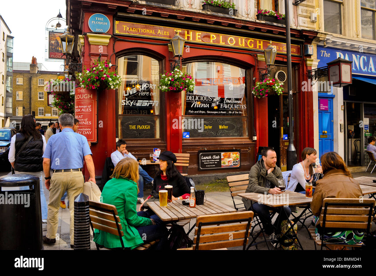 People Sharing Drinks on Terrace, Old British Pubs, Bars, London