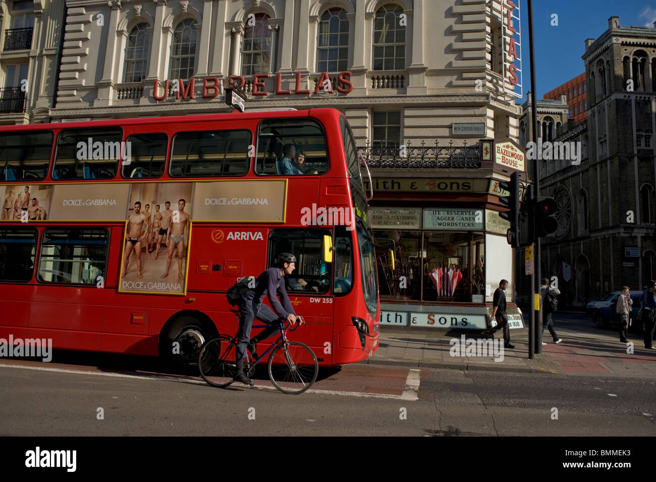 Men Cycling on Oxford Street, London, UK, London BUs, Public transport bus  Stock Photo - Alamy