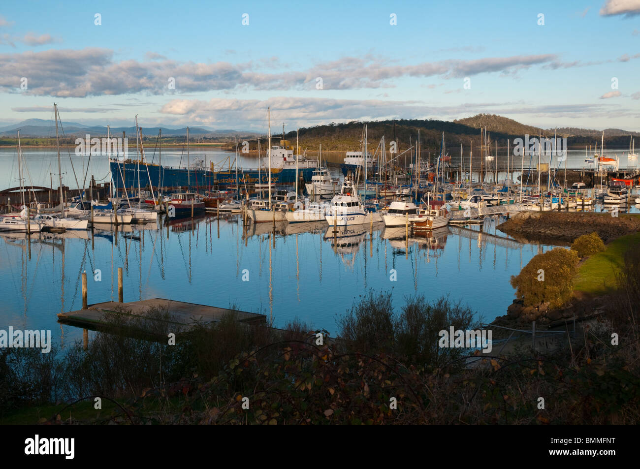 Yachts and the Australian Maritime College ship moored on the Tamar River in Tasmania at Beauty Point Stock Photo