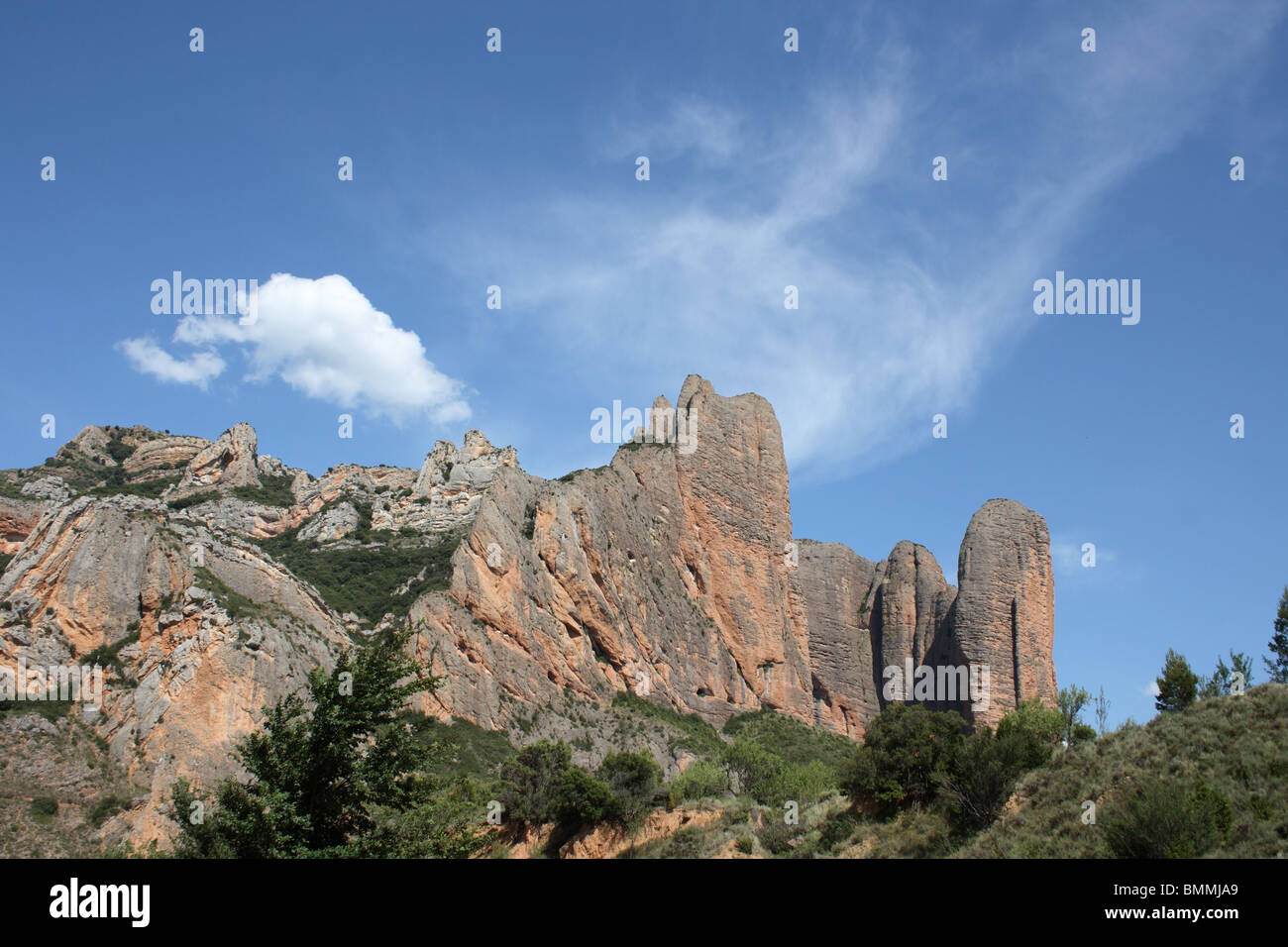 Los Mallos de Riglos rock formations, Huesca to Pamplona Road, Pyrenees, Aragon Stock Photo