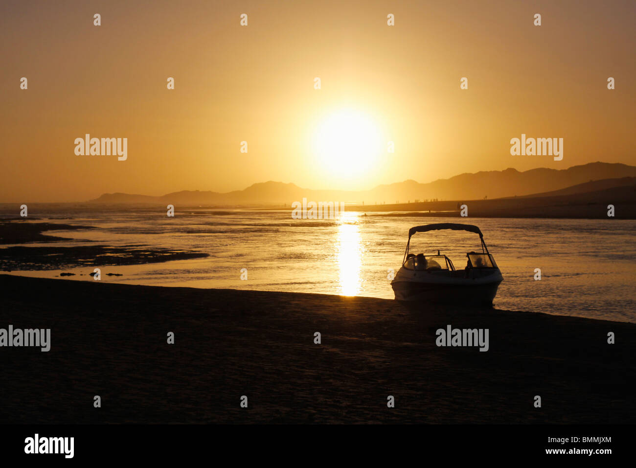 Sunset over boat on sea hi-res stock photography and images - Alamy