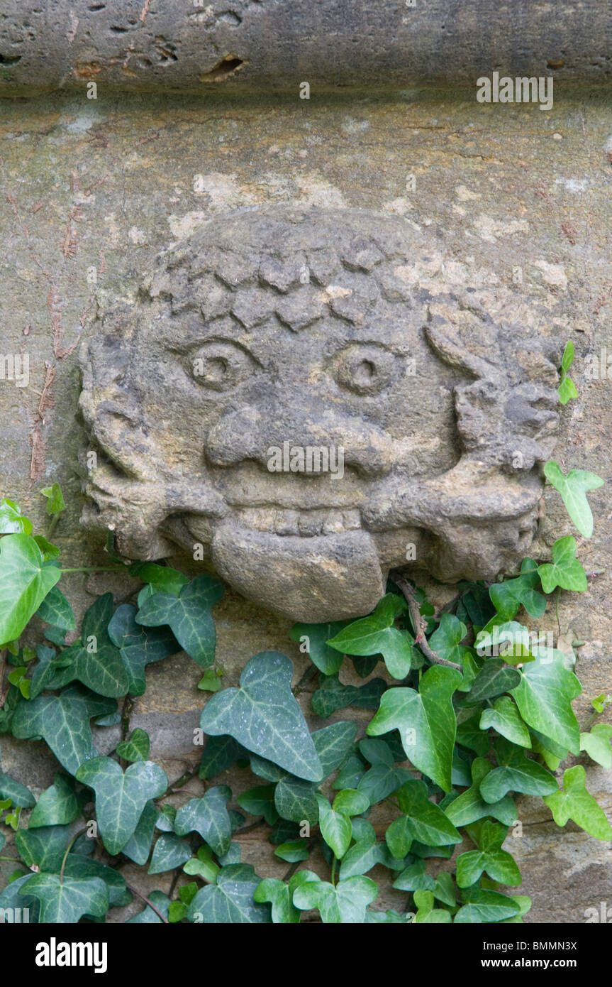 Green man stone carving Stock Photo