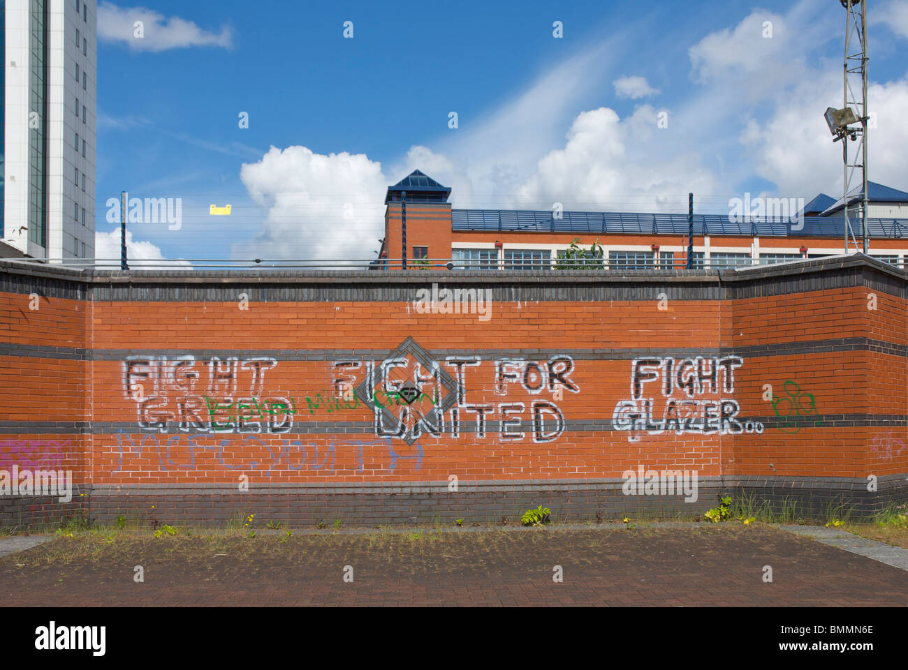Grafitti on wall near Old Trafford football ground, Manchester, England UK Stock Photo