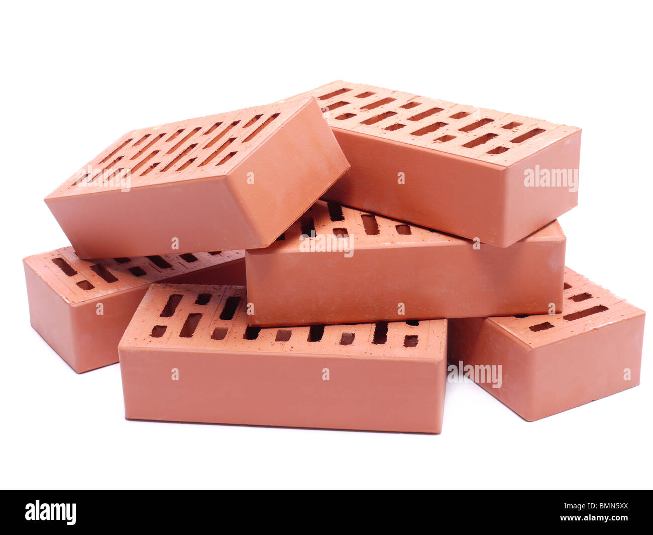 Pile of perforated bricks over white background Stock Photo