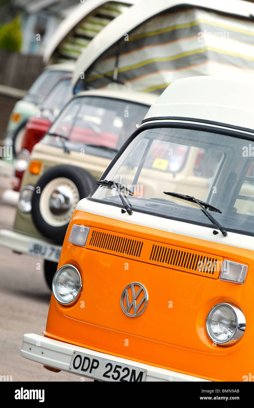 Several classic VW camper vans lined up ready for their travels. Stock Photo